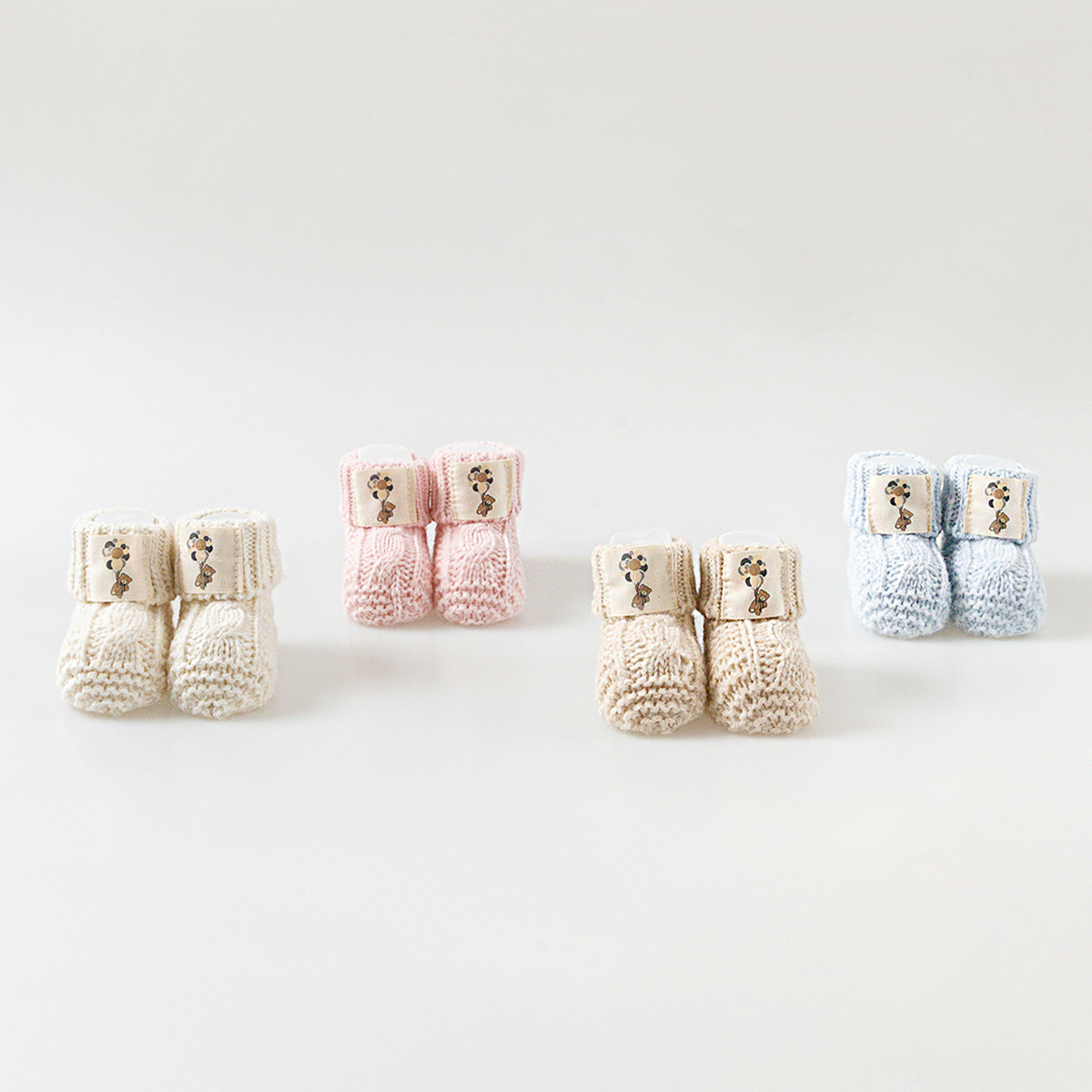 Knit Booties With Bear Honey and Hive