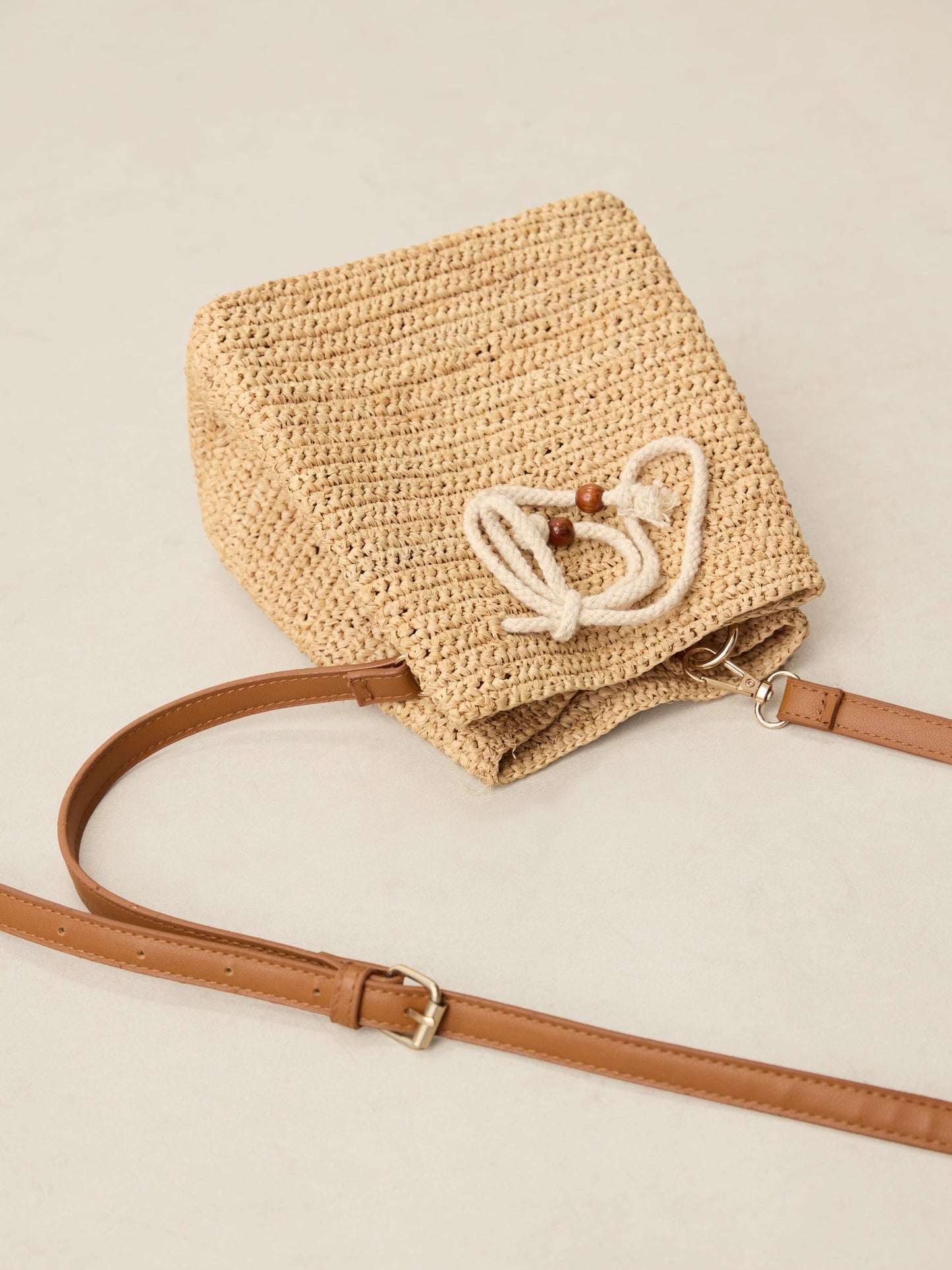 Mini Handwoven Raffia Drawstring Crossbody Bag LINTICO