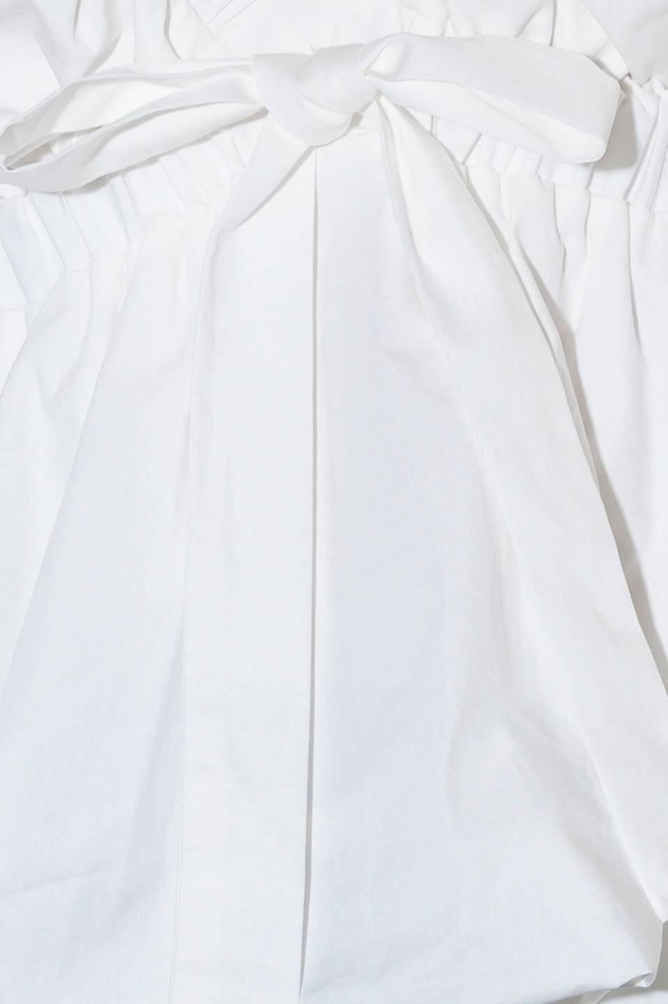 SLOW DOWN IN WHITE WOVEN TOP Flying Tomato