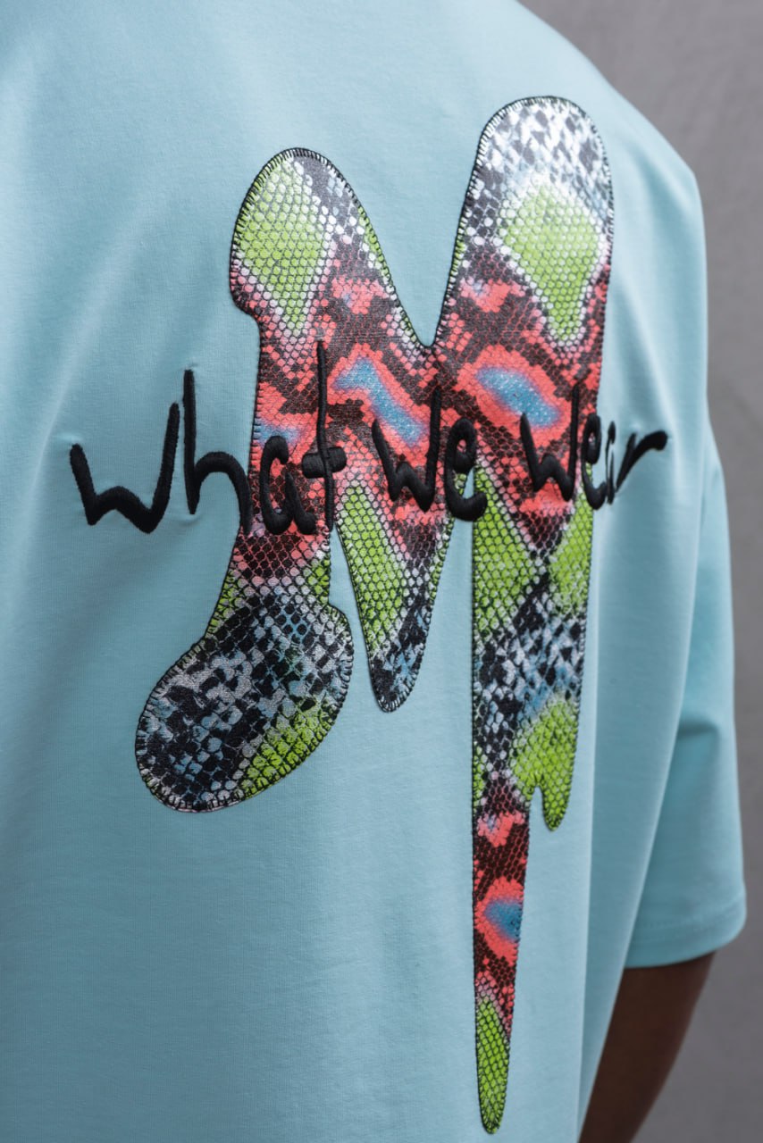 Oversize Graphic Cotton Tee – "What We Wear" Abstract Print Withinblack