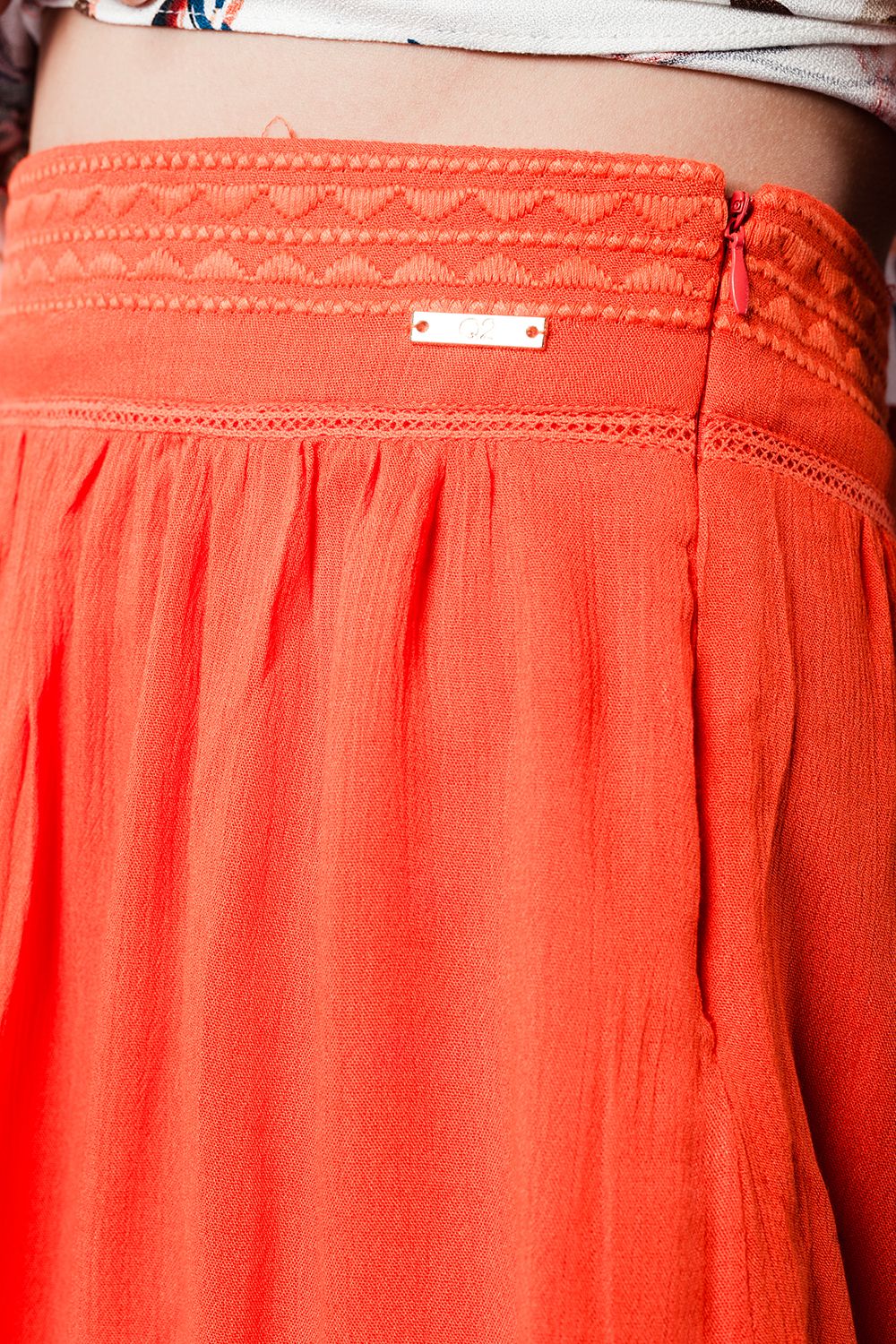Aztec orange mini skirt Q2store