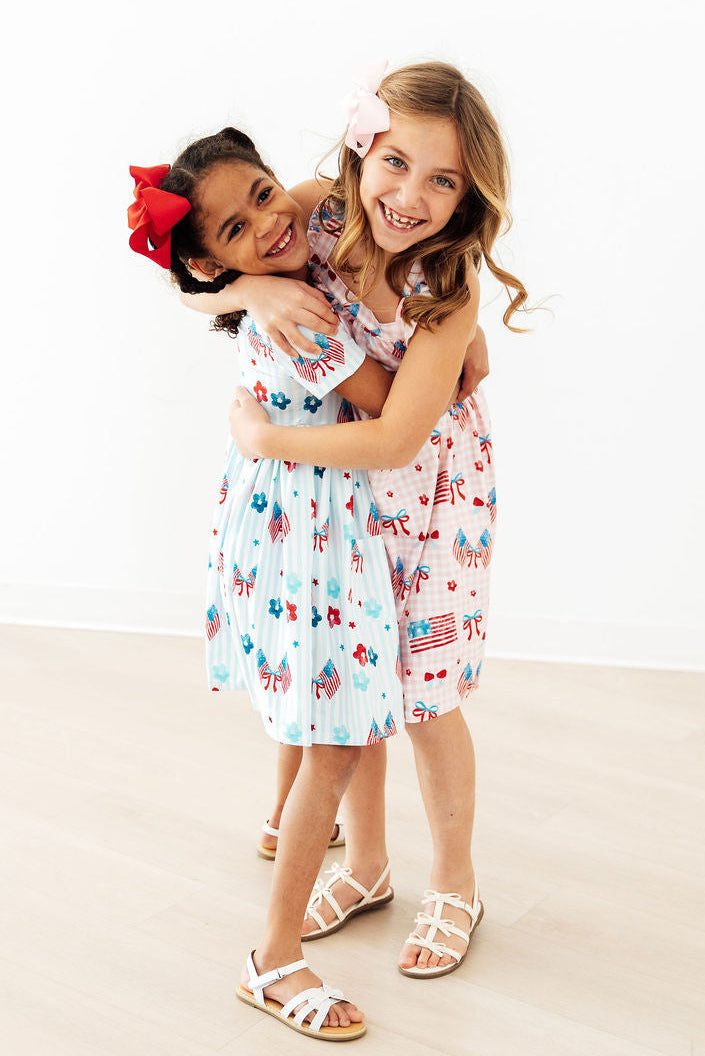 Fancy Flags Ruffle Cross Back Dress Mila & Rose ®