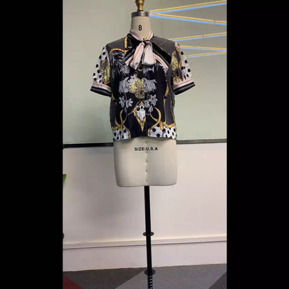 Printed chain shirt bow puff sleeve See size chart under “more details” The Fashion Celestial
