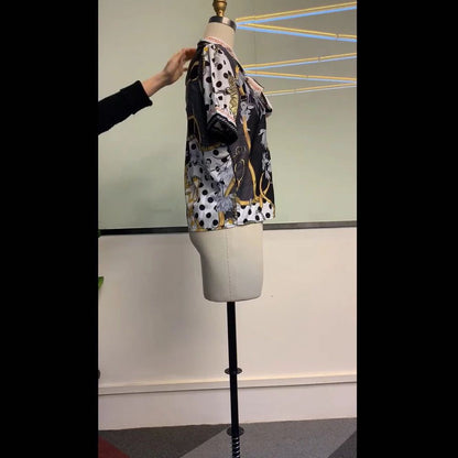 Printed chain shirt bow puff sleeve See size chart under “more details” The Fashion Celestial