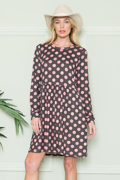 Cross Back Polka Dot Dress with Pockets See size chart under “more details” The Fashion Celestial