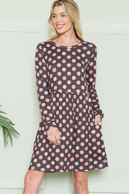 Cross Back Polka Dot Dress with Pockets See size chart under “more details” The Fashion Celestial