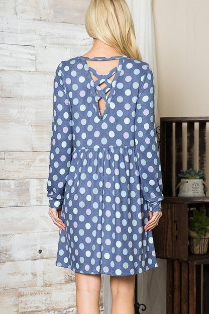 Cross Back Polka Dot Dress with Pockets See size chart under “more details” The Fashion Celestial