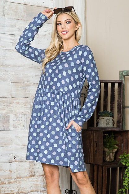 Cross Back Polka Dot Dress with Pockets See size chart under “more details” The Fashion Celestial