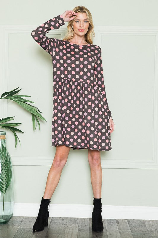 Cross Back Polka Dot Dress with Pockets See size chart under “more details” The Fashion Celestial
