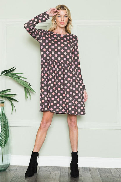 Cross Back Polka Dot Dress with Pockets See size chart under “more details” The Fashion Celestial