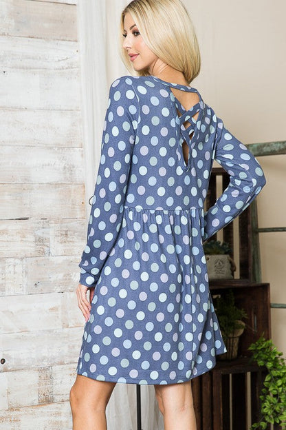 Cross Back Polka Dot Dress with Pockets See size chart under “more details” The Fashion Celestial