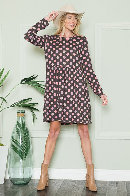 Cross Back Polka Dot Dress with Pockets See size chart under “more details” The Fashion Celestial
