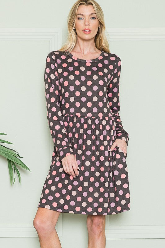 Cross Back Polka Dot Dress with Pockets See size chart under “more details” The Fashion Celestial
