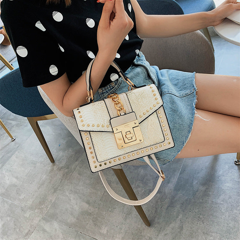 Fashion snake pattern handbag See size chart under “more details” The Fashion Celestial