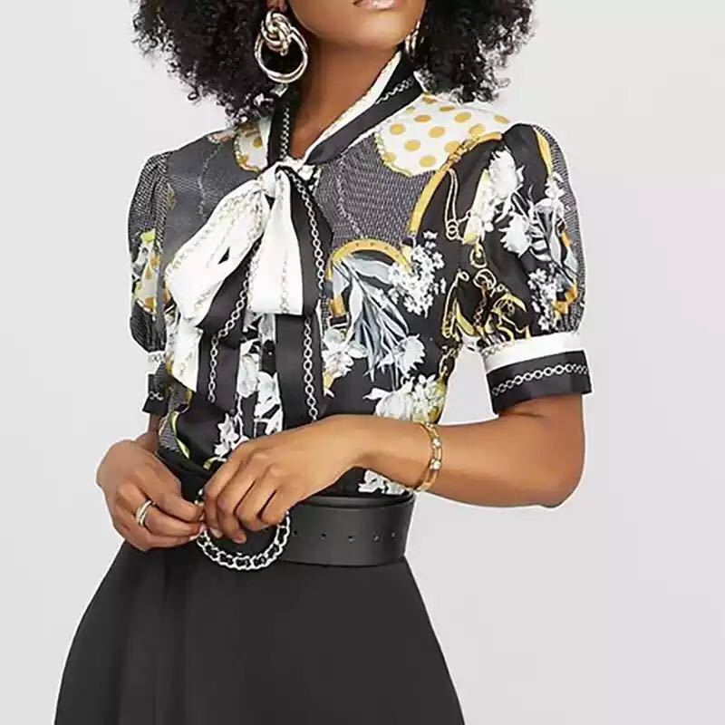 Printed chain shirt bow puff sleeve See size chart under “more details” The Fashion Celestial