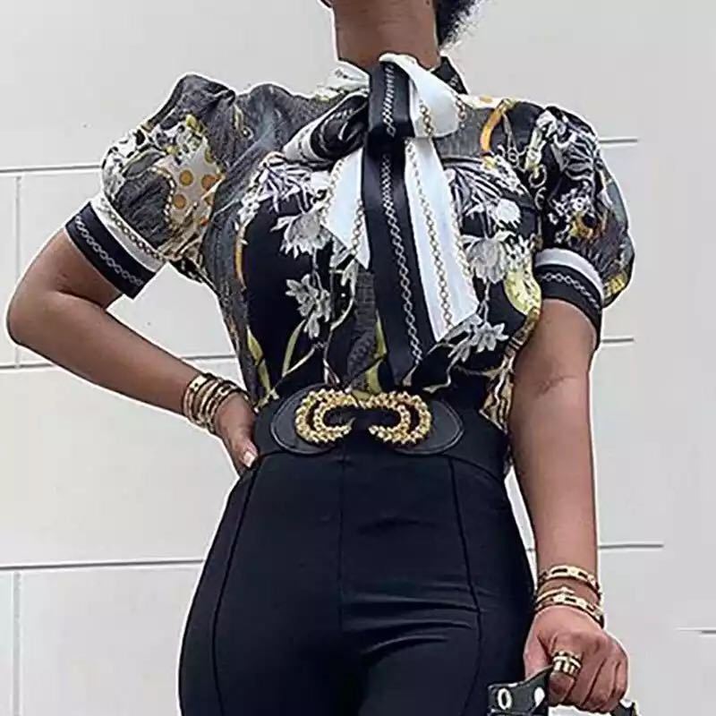 Printed chain shirt bow puff sleeve See size chart under “more details” The Fashion Celestial