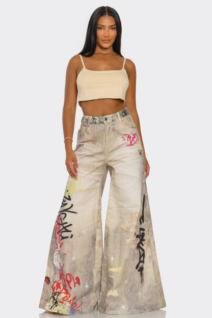 Street Poet Graffiti Wide-Leg Jeans See size chart under “more details” The Fashion Celestial