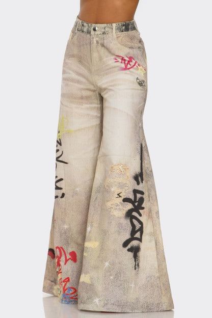 Street Poet Graffiti Wide-Leg Jeans See size chart under “more details” The Fashion Celestial