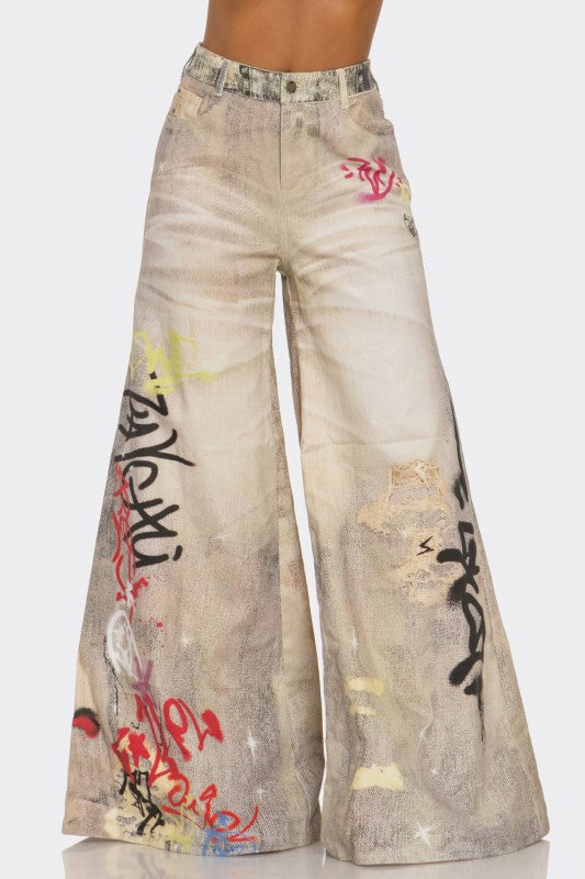 Street Poet Graffiti Wide-Leg Jeans See size chart under “more details” The Fashion Celestial