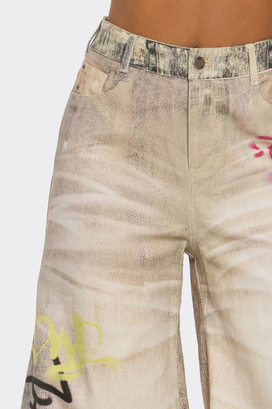 Street Poet Graffiti Wide-Leg Jeans See size chart under “more details” The Fashion Celestial