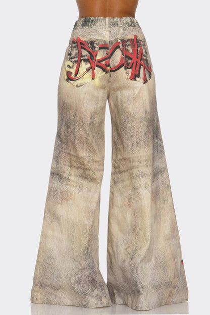 Street Poet Graffiti Wide-Leg Jeans See size chart under “more details” The Fashion Celestial