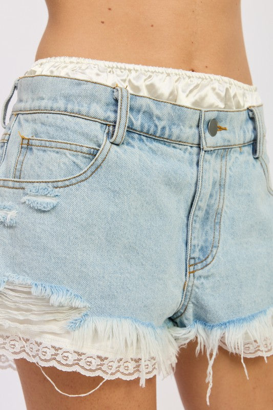 HIGH RISE DENIM SHORTS WITH LACE TRIM See size chart under “more details” The Fashion Celestial