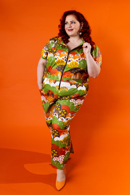 Jumpsuit in Earth-toned Meadow Print Blue Platypus Clothing