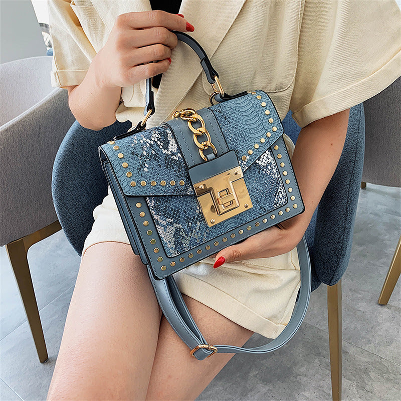 Fashion snake pattern handbag See size chart under “more details” The Fashion Celestial