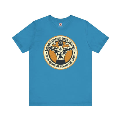 Building Muscle Since Day One T-Shirt The Devil's Pickle