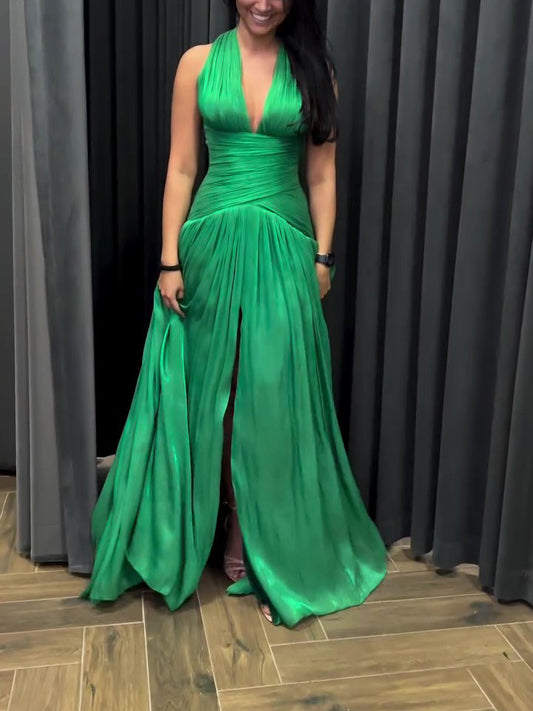 Emerald Green Plunging Neckline Gown With Pleated Skirt And Side Slit See size chart under “more details” The Fashion Celestial