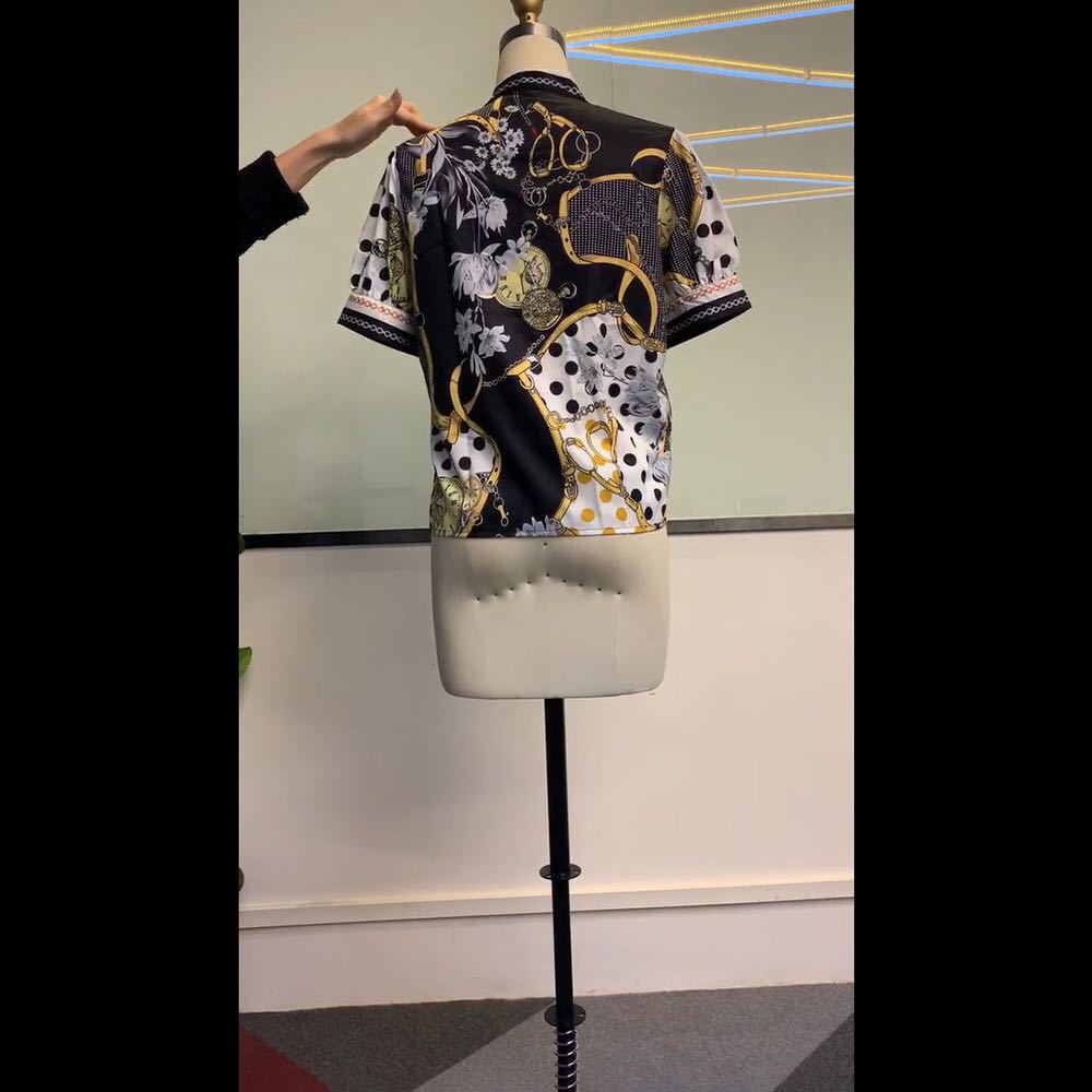 Printed chain shirt bow puff sleeve See size chart under “more details” The Fashion Celestial