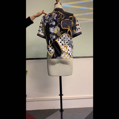 Printed chain shirt bow puff sleeve See size chart under “more details” The Fashion Celestial