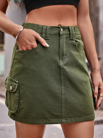 Denim Mini Skirt with Pockets See size chart under “more details” The Fashion Celestial