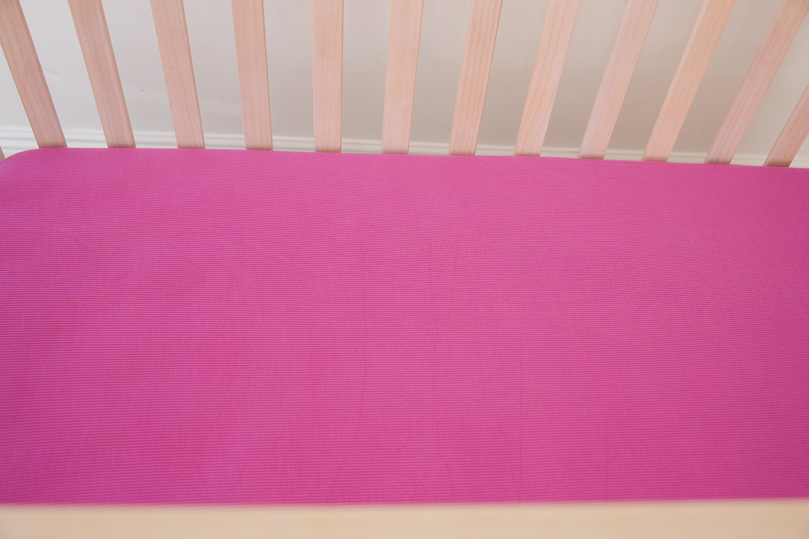 (SOLID, ribbed) Rainbow Royal - Crib Sheet Blush Lotus