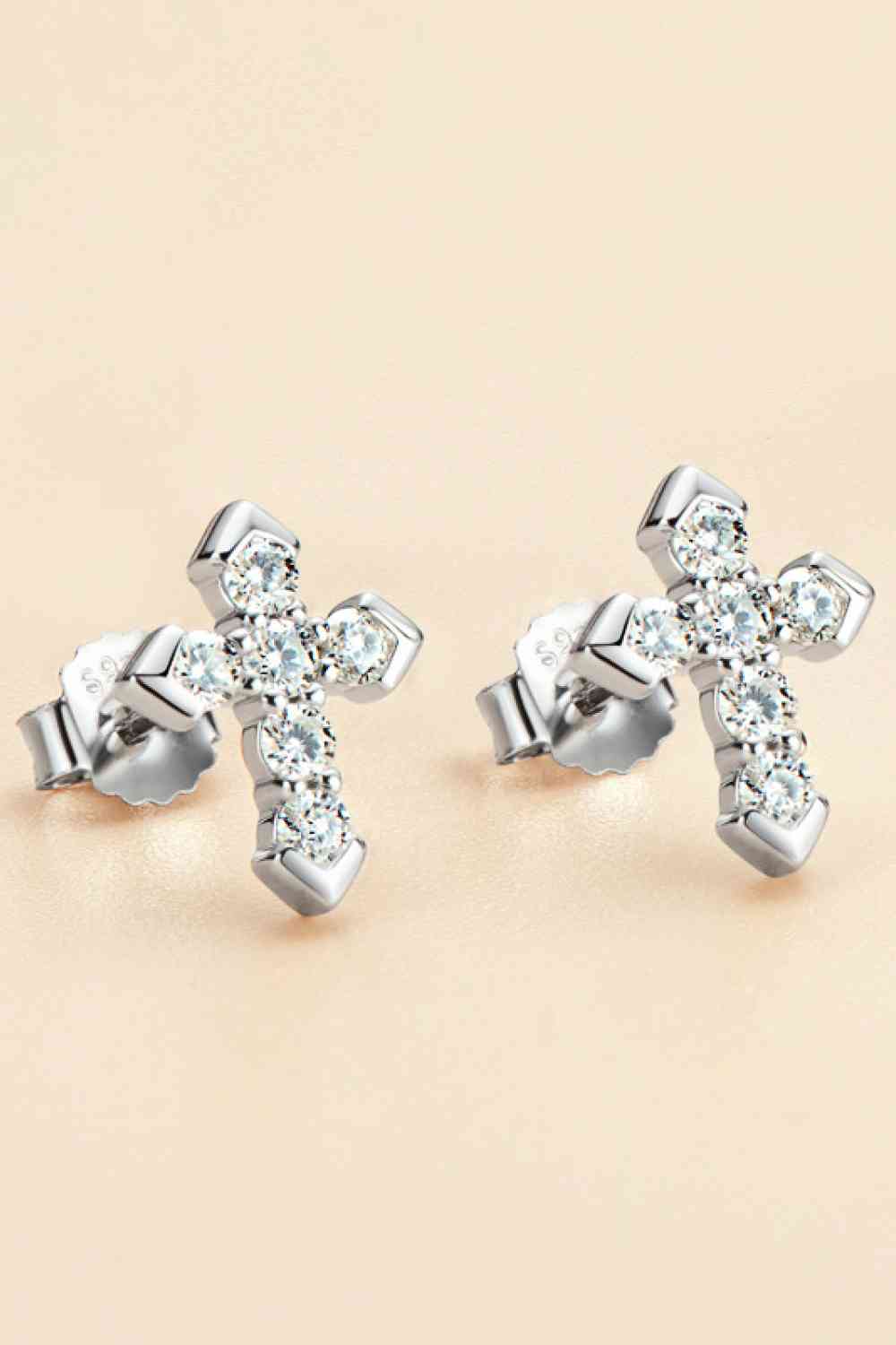 Moissanite Elegance Cross Stud Earrings – Minimalist Design in Platinum-Plated Silver See size chart under “more details” The Fashion Celestial