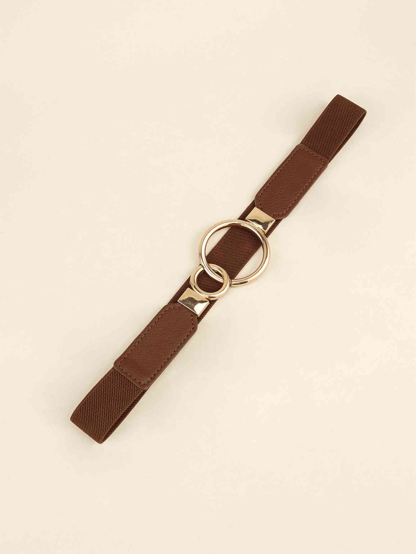 ElegantStyle Double Ring Buckle Elastic PU Belt – Adjustable Comfort Fit See size chart under “more details” The Fashion Celestial