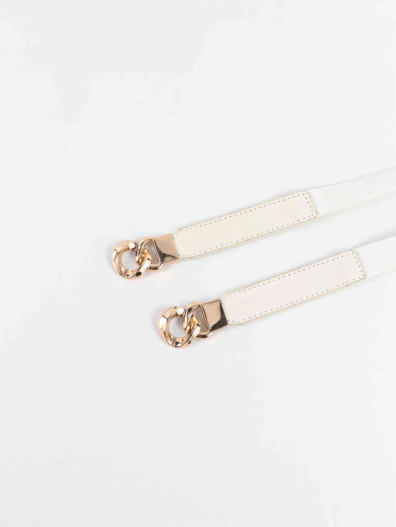ElegantStyle Zinc Alloy Buckle Elastic PU Belt – Versatile and Stylish Accessory See size chart under “more details” The Fashion Celestial