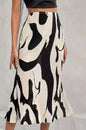Women's Zebra Print Pleated Skirt – Irregular Hem & Side Slit FitiqueFit