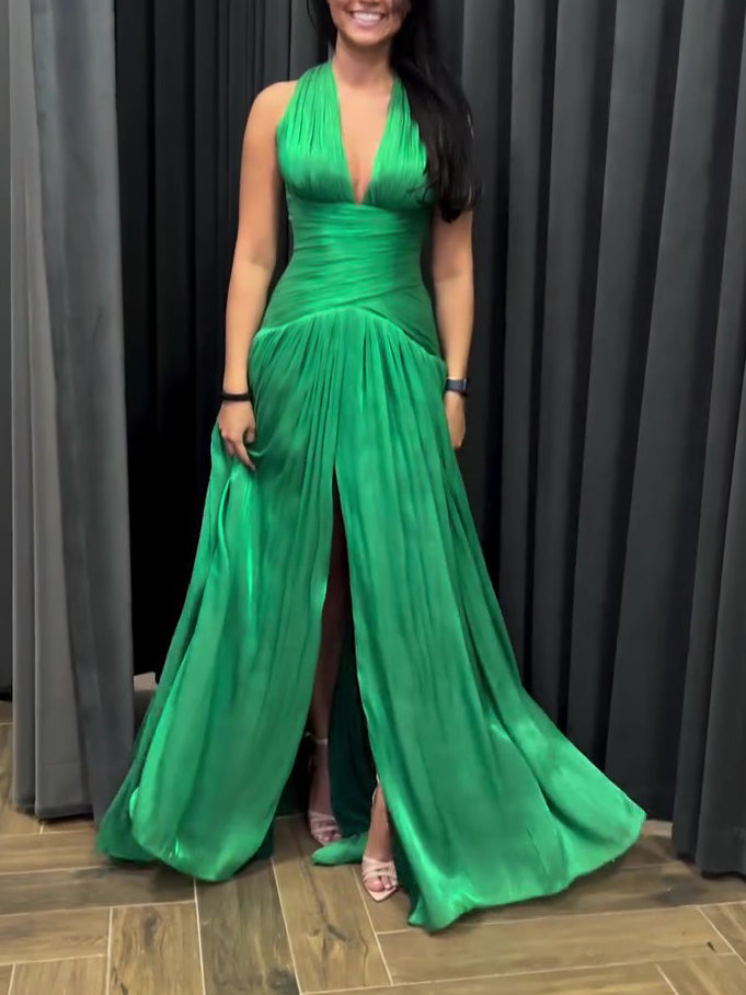 Emerald Green Plunging Neckline Gown With Pleated Skirt And Side Slit See size chart under “more details” The Fashion Celestial
