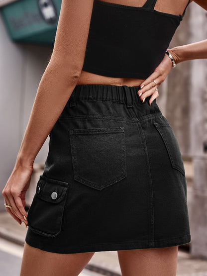Denim Mini Skirt with Pockets See size chart under “more details” The Fashion Celestial