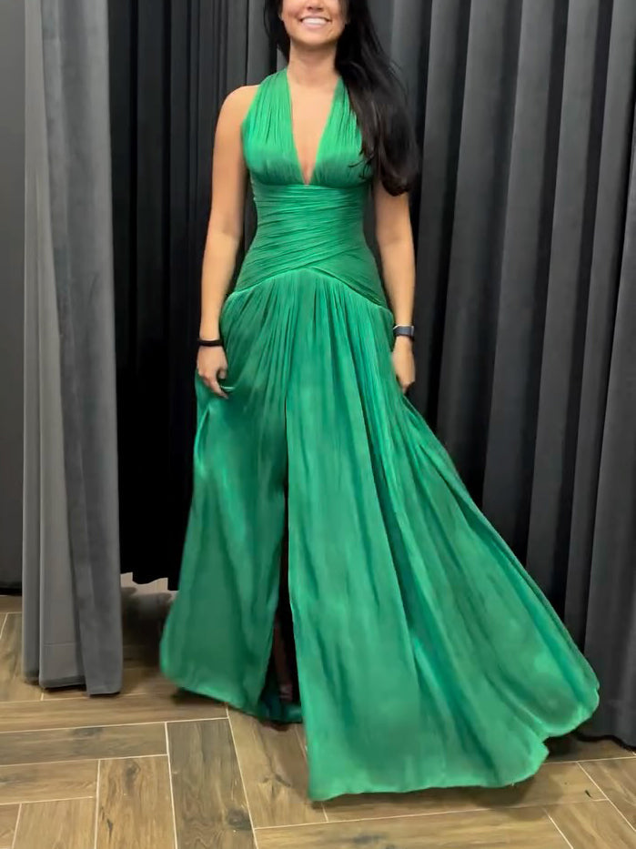 Emerald Green Plunging Neckline Gown With Pleated Skirt And Side Slit See size chart under “more details” The Fashion Celestial