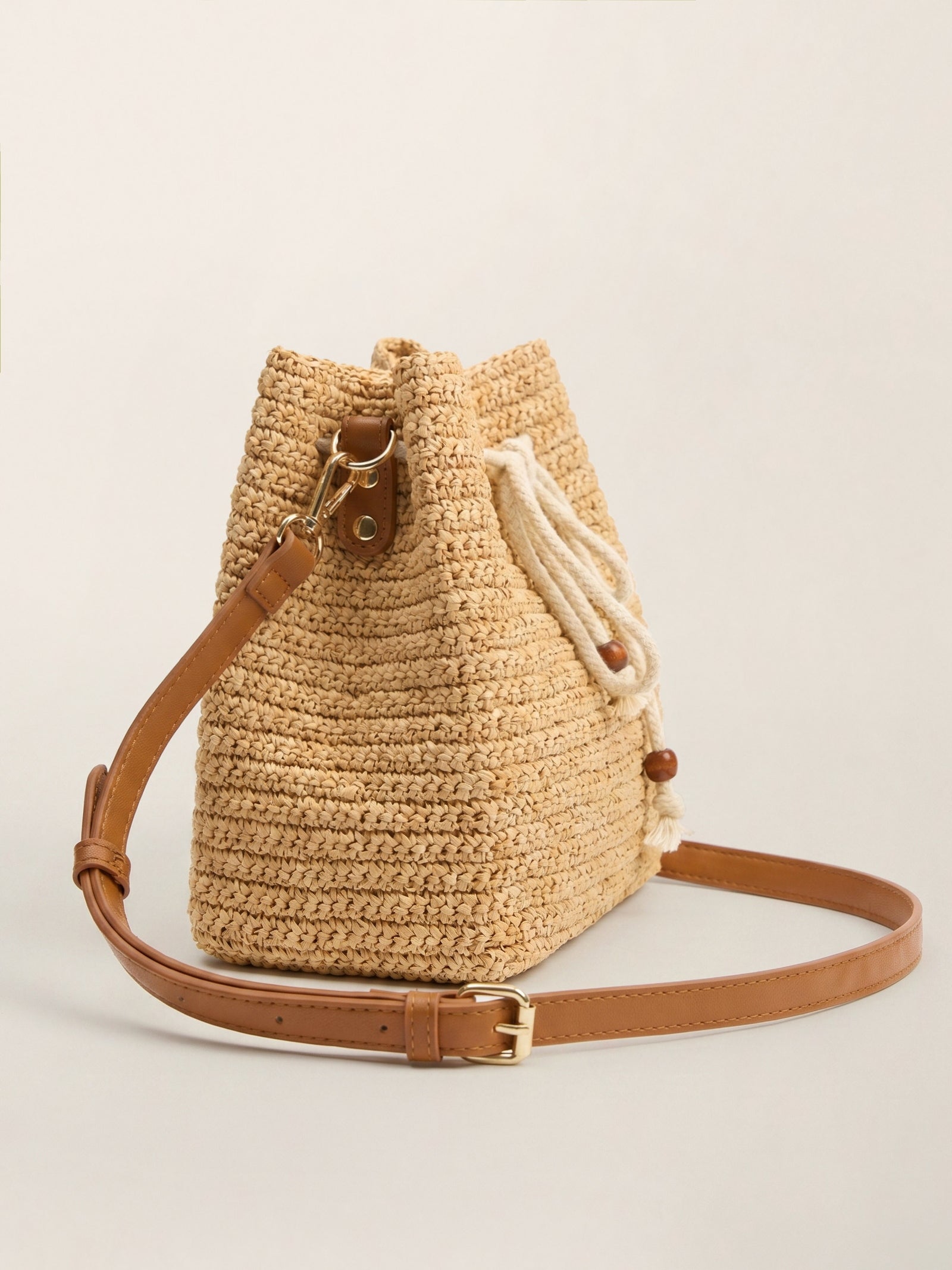 Mini Handwoven Raffia Drawstring Crossbody Bag LINTICO