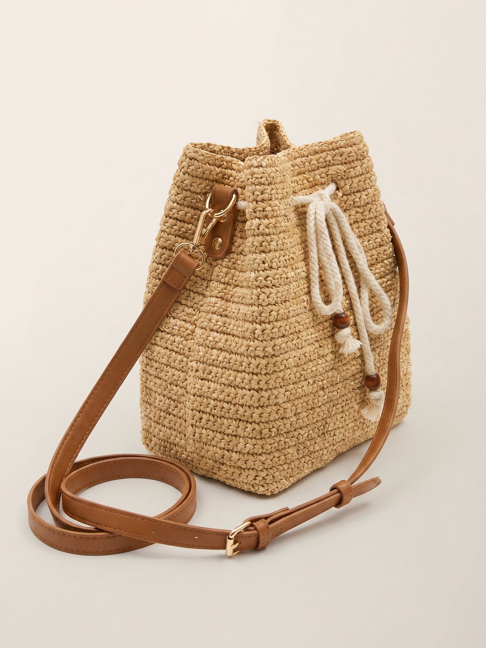 Mini Handwoven Raffia Drawstring Crossbody Bag LINTICO
