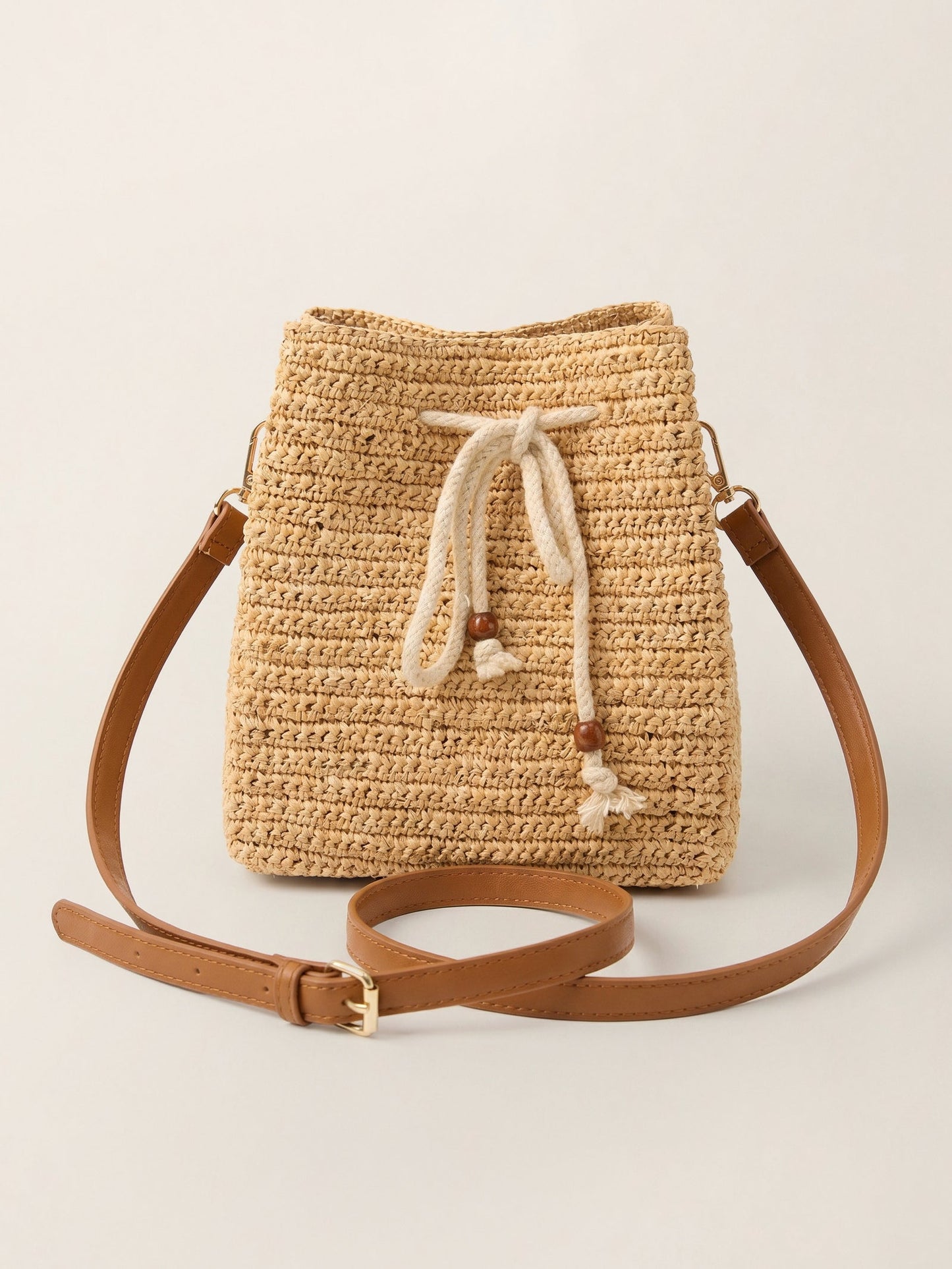 Mini Handwoven Raffia Drawstring Crossbody Bag LINTICO