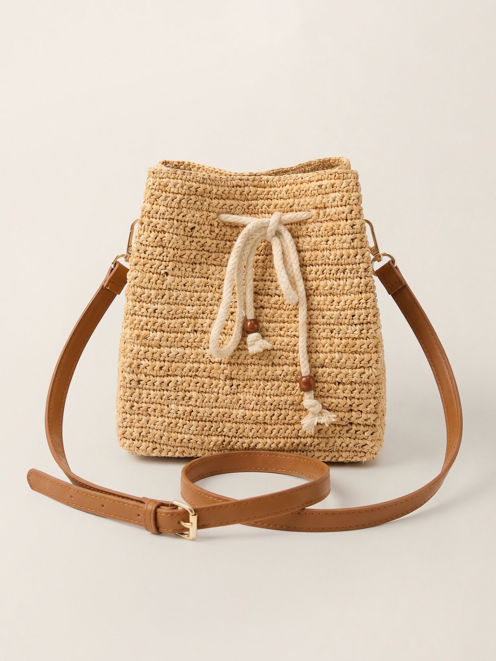 Mini Handwoven Raffia Drawstring Crossbody Bag LINTICO