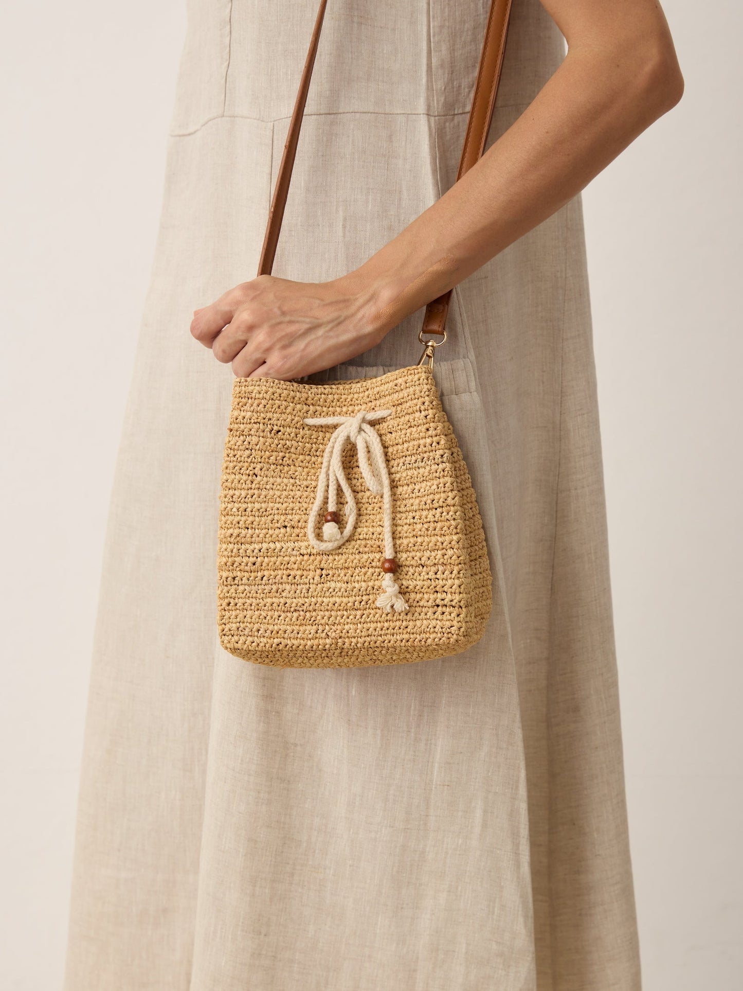 Mini Handwoven Raffia Drawstring Crossbody Bag LINTICO