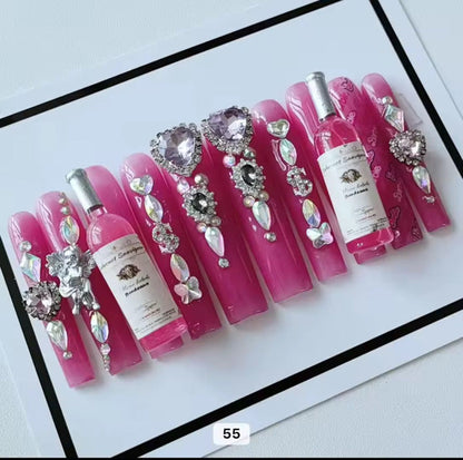 Pink acrylic press on nails with champagne HOL stores
