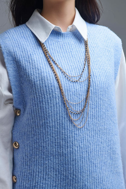 Blue sleeveless sweater with gold buttons on side Q2store