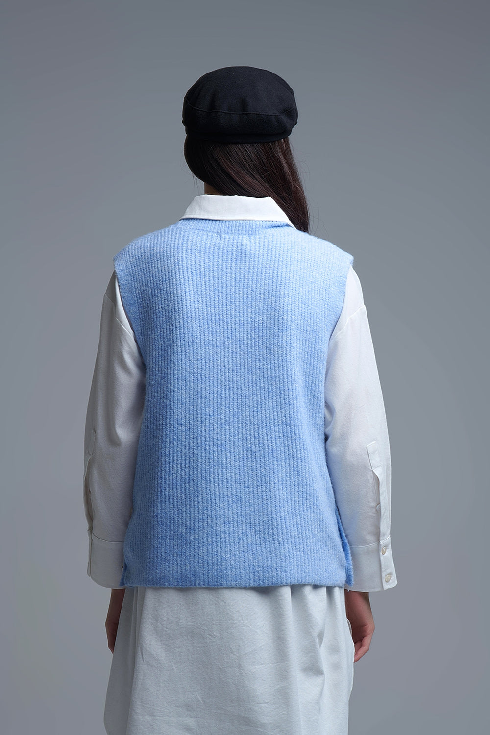 Blue sleeveless sweater with gold buttons on side Q2store