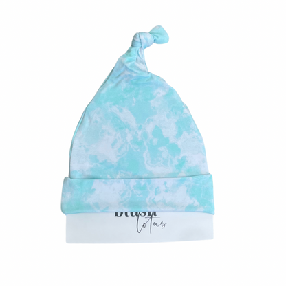 Oasis - Top-knot hat Blush Lotus